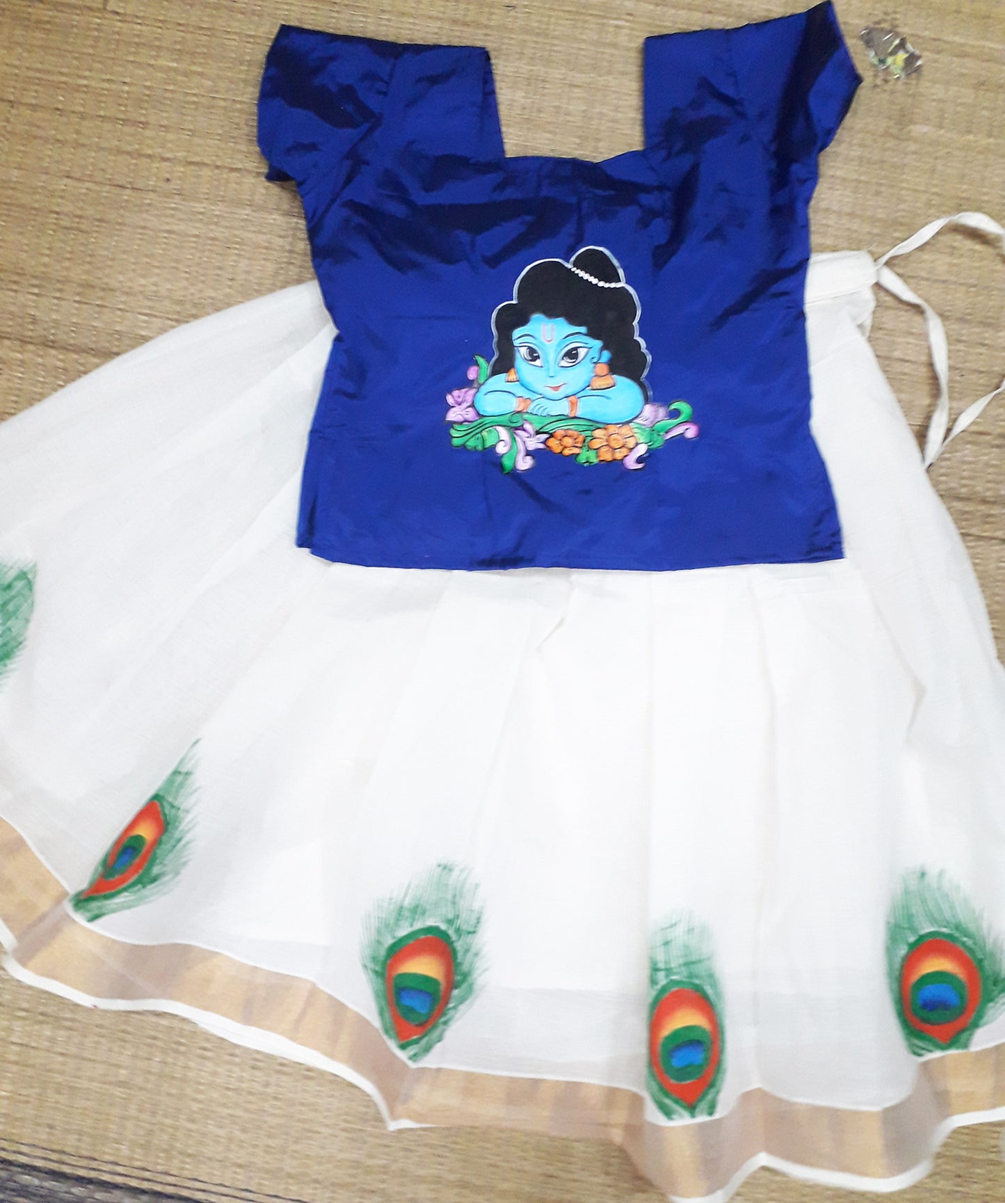 Cute Krishna face hand mural painting on blue kerala pattu pavada