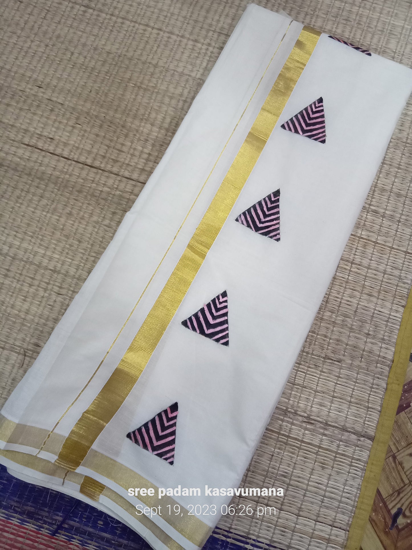 Block design hand painting on kerala kasavu mundu