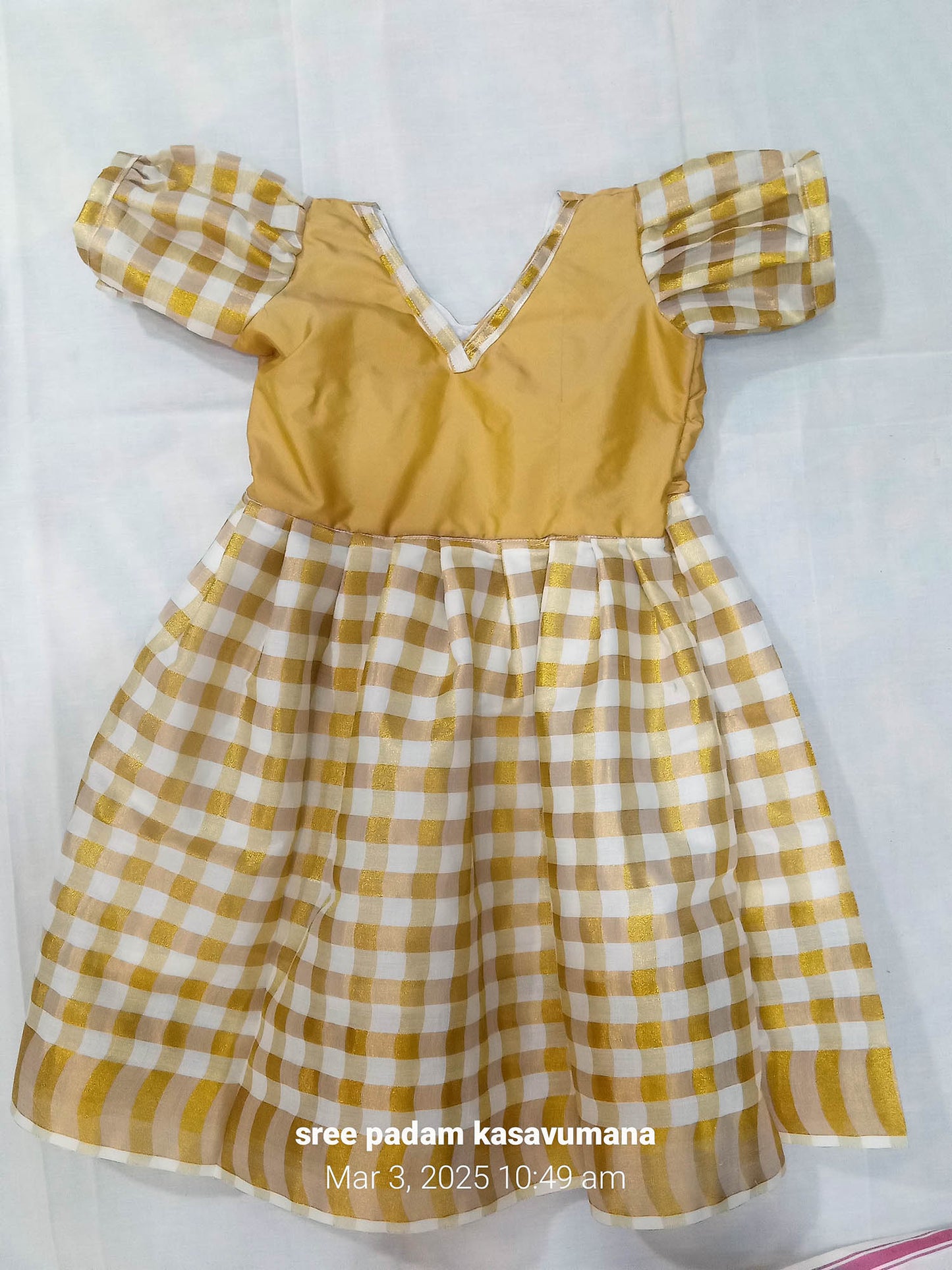 check design tissue golden kerala style frock for kids
