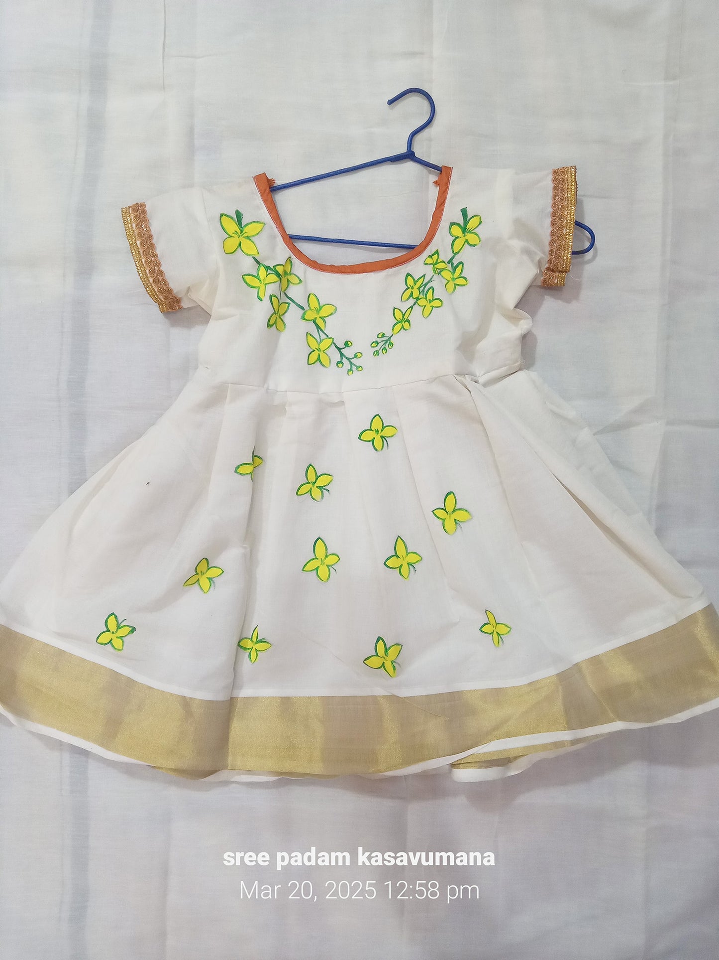 Vishu special kannikonna mural painting design kerala kasavu frock for kids