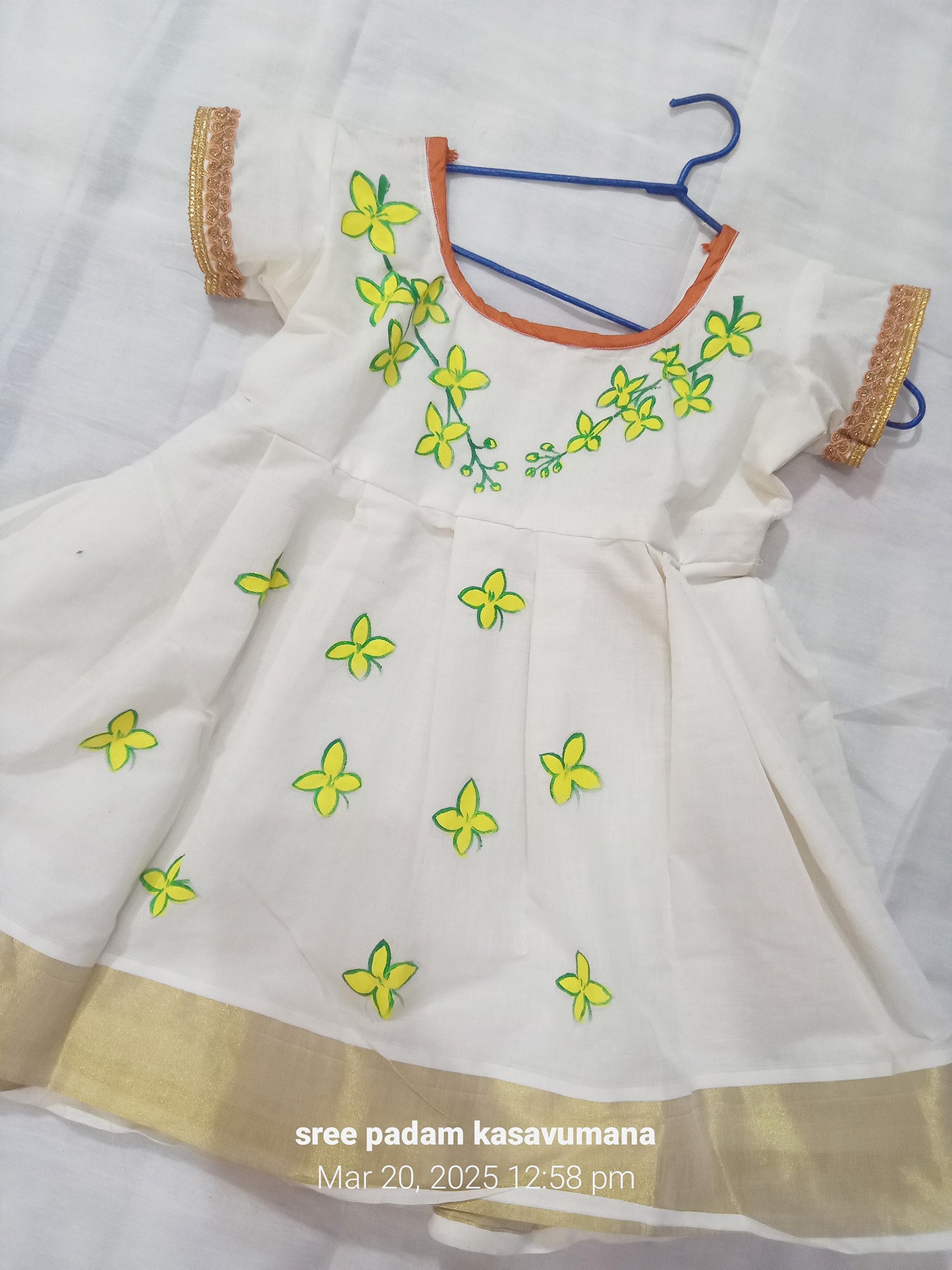 Vishu special kannikonna mural painting design kerala kasavu frock for kids