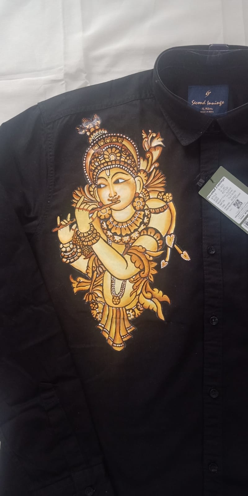 Copper shade Krishna hand mural painting on black cotton shirt