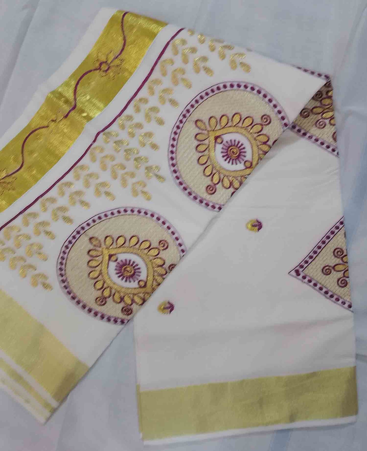 Golden flower embroidery designer kerala kasavu saree