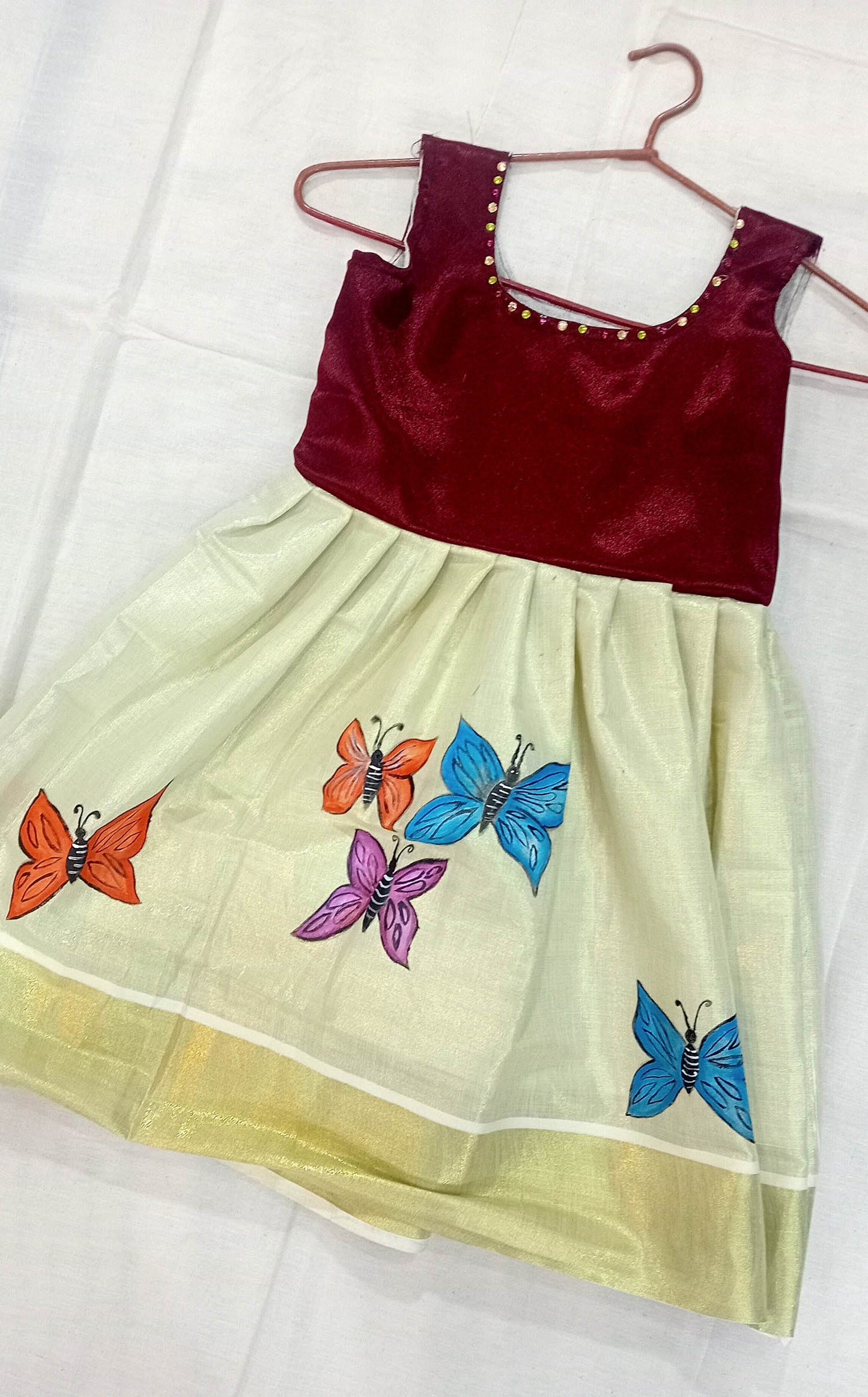 Butterfly design hand mural painting on kerala tissue kasavu frock for kids