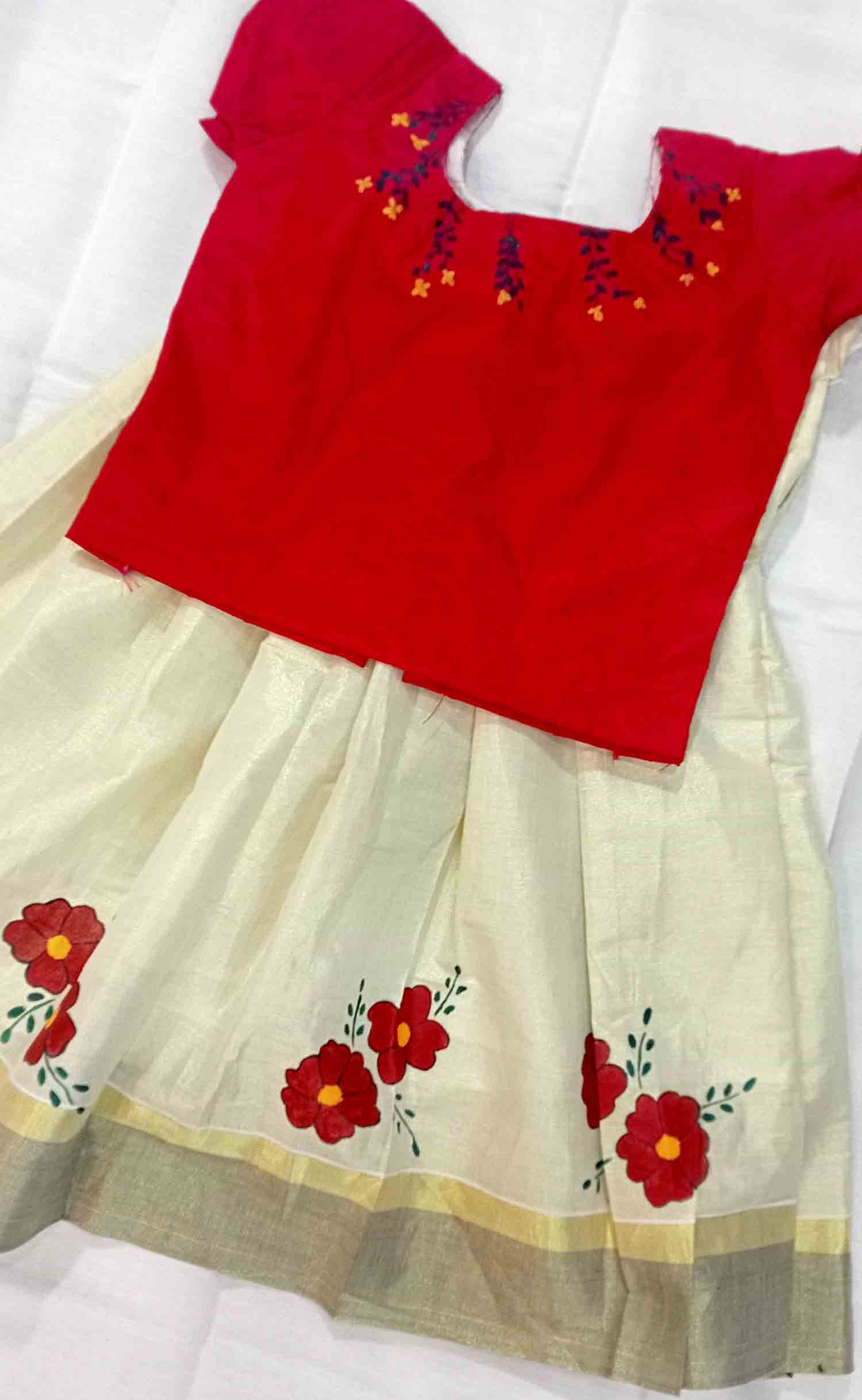 Flower design hand mural kerala tissue pattu pavada with red blouse for kids