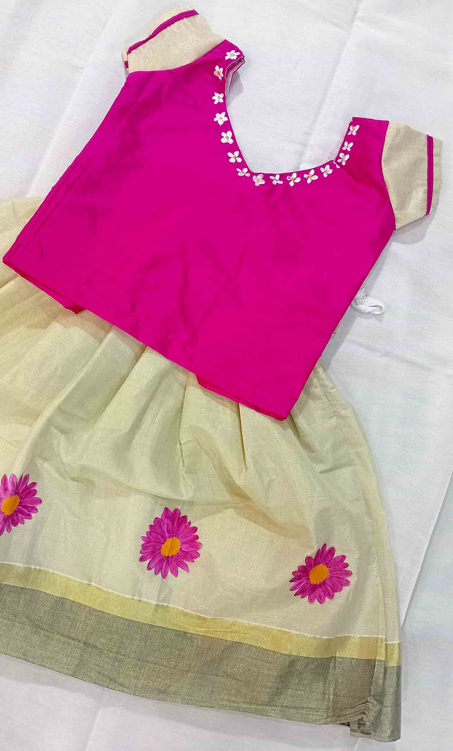 Flower design hand mural kerala tissue pattu pavada with magenta blouse for kids