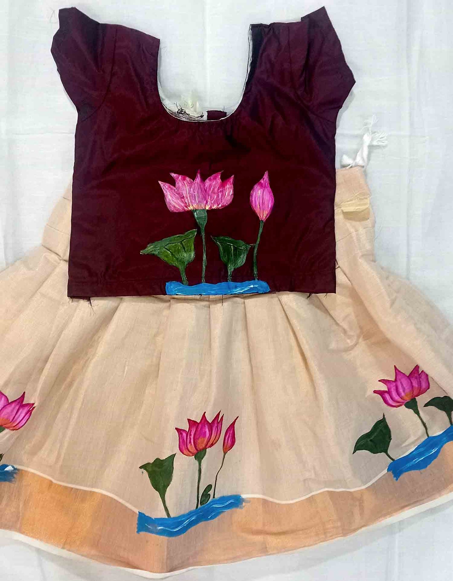 Designer hand mural painting lotus design tissue pattu pavada with maroon blouse