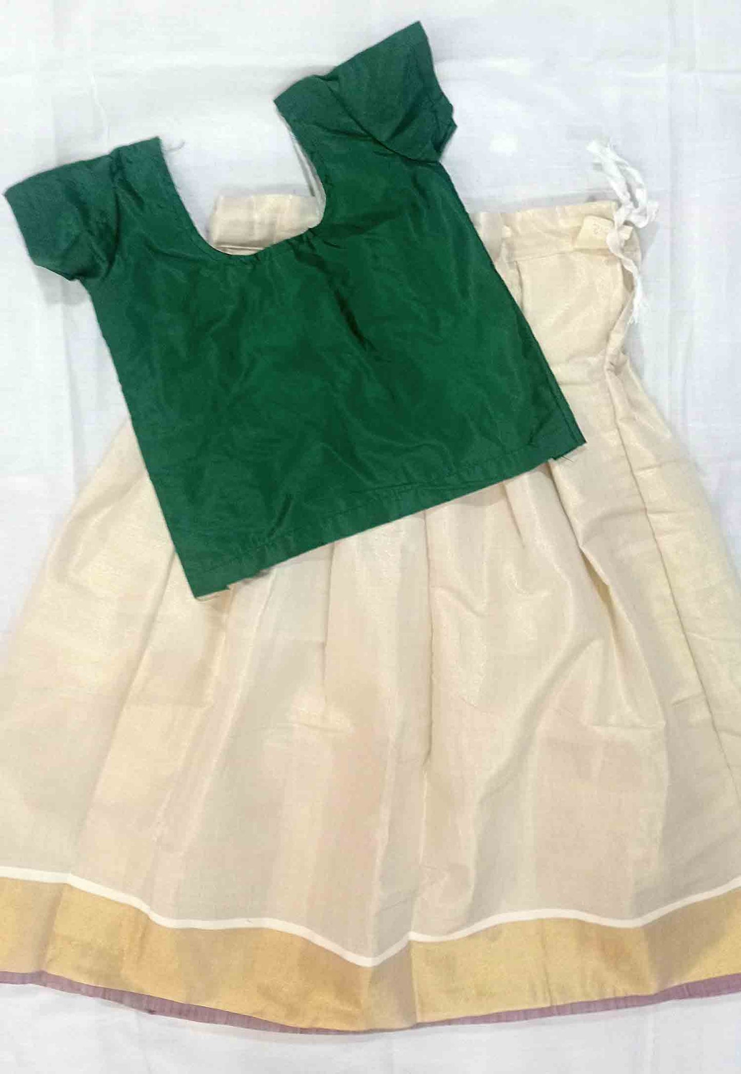 kerala copper tissue pattu pavada with green blouse at low price for kids