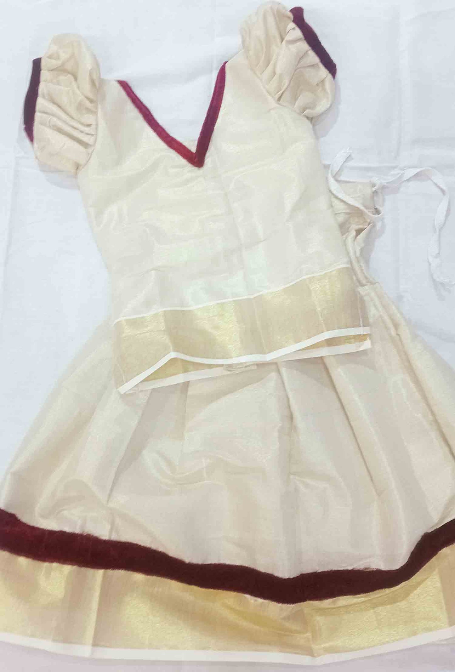 Kerala tissue pattu pavada with maroon velvet border for kids