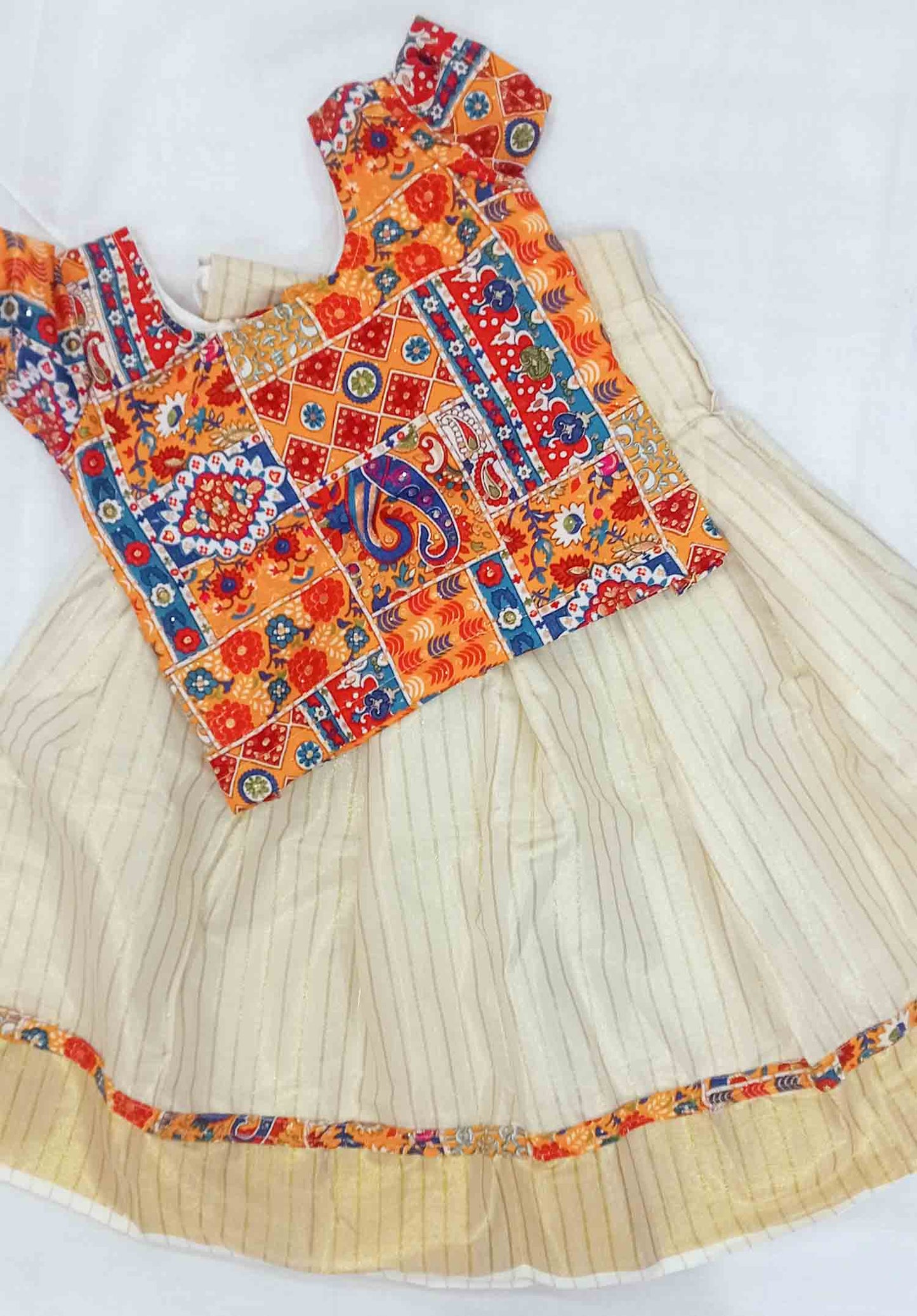Line design kerala tissue kids pattu pavads with kalamkari border and blouse