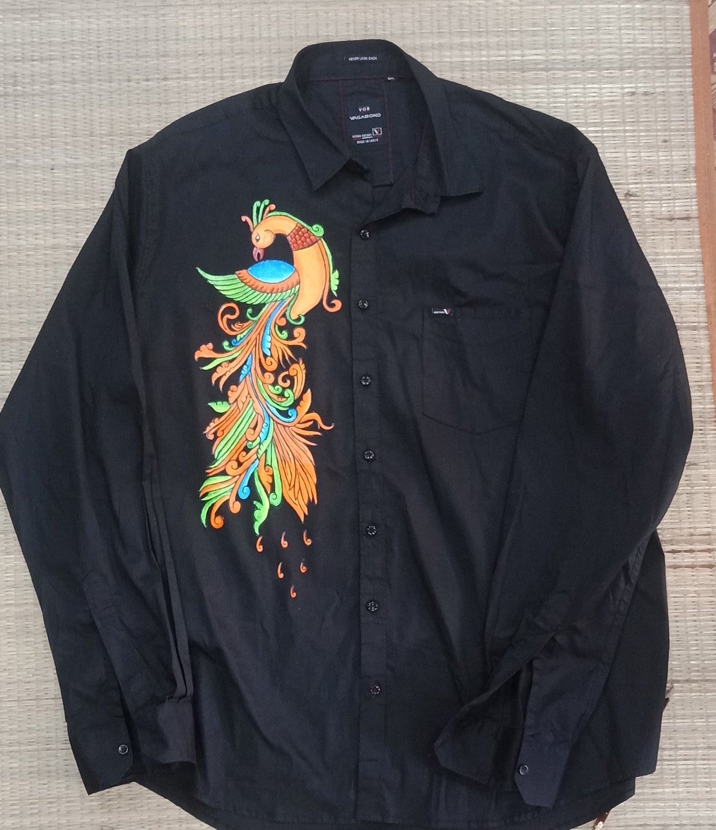 Peacock design mural hand painting on black cotton shirt