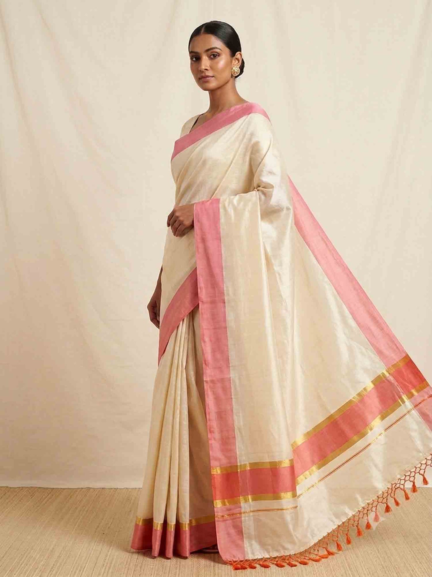 Orange big border kerala tissue kasavu saree