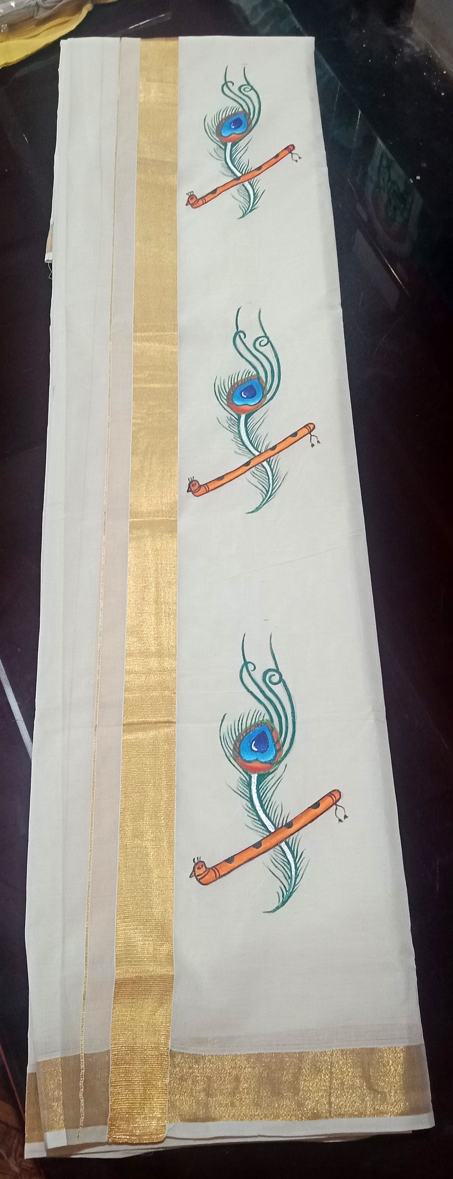 Stylish mazhil peeli hand mural painting on kasavu mundu - 4 meter