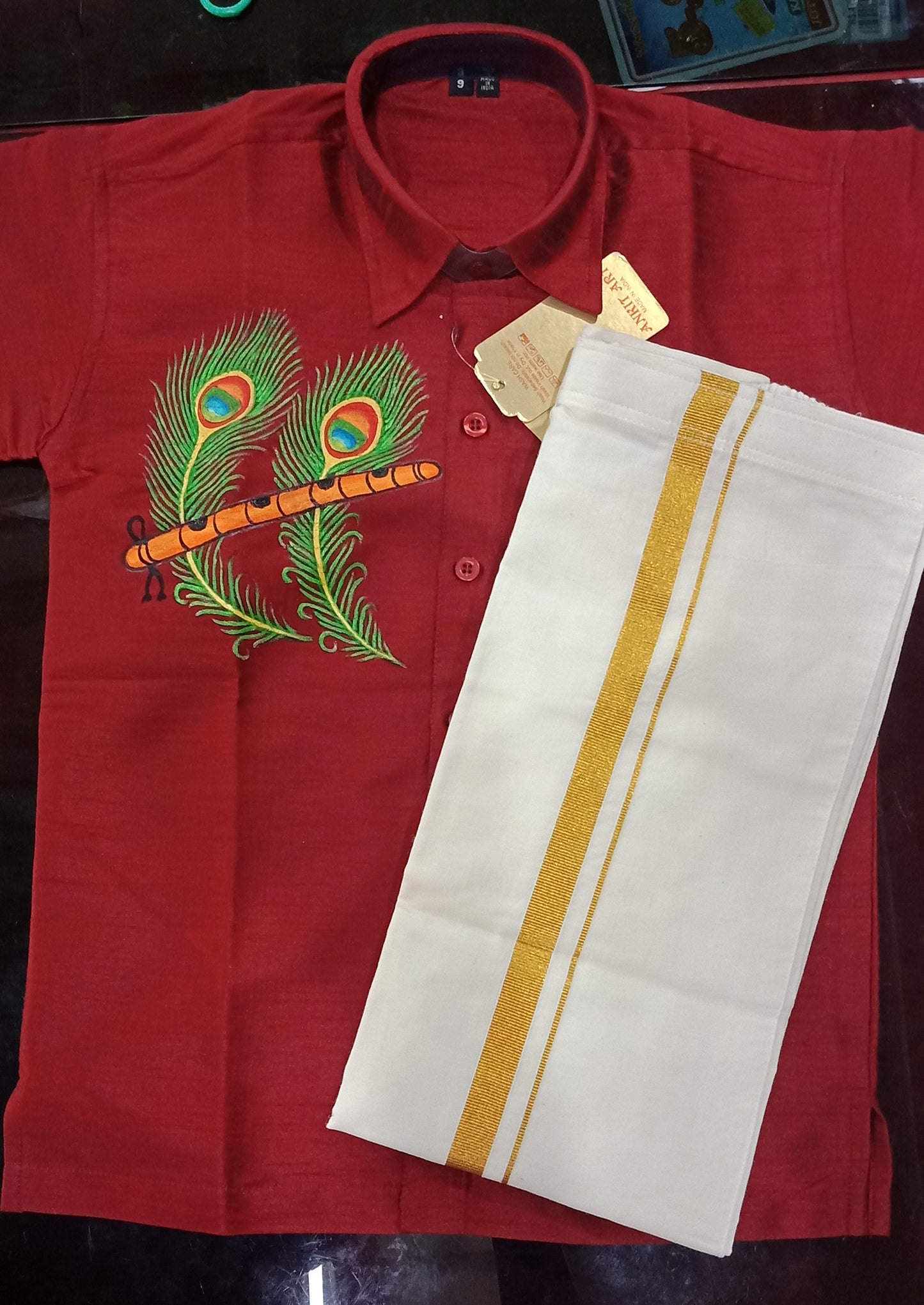 Beautiful double peeli with flute hand mural painting in kids red shirt