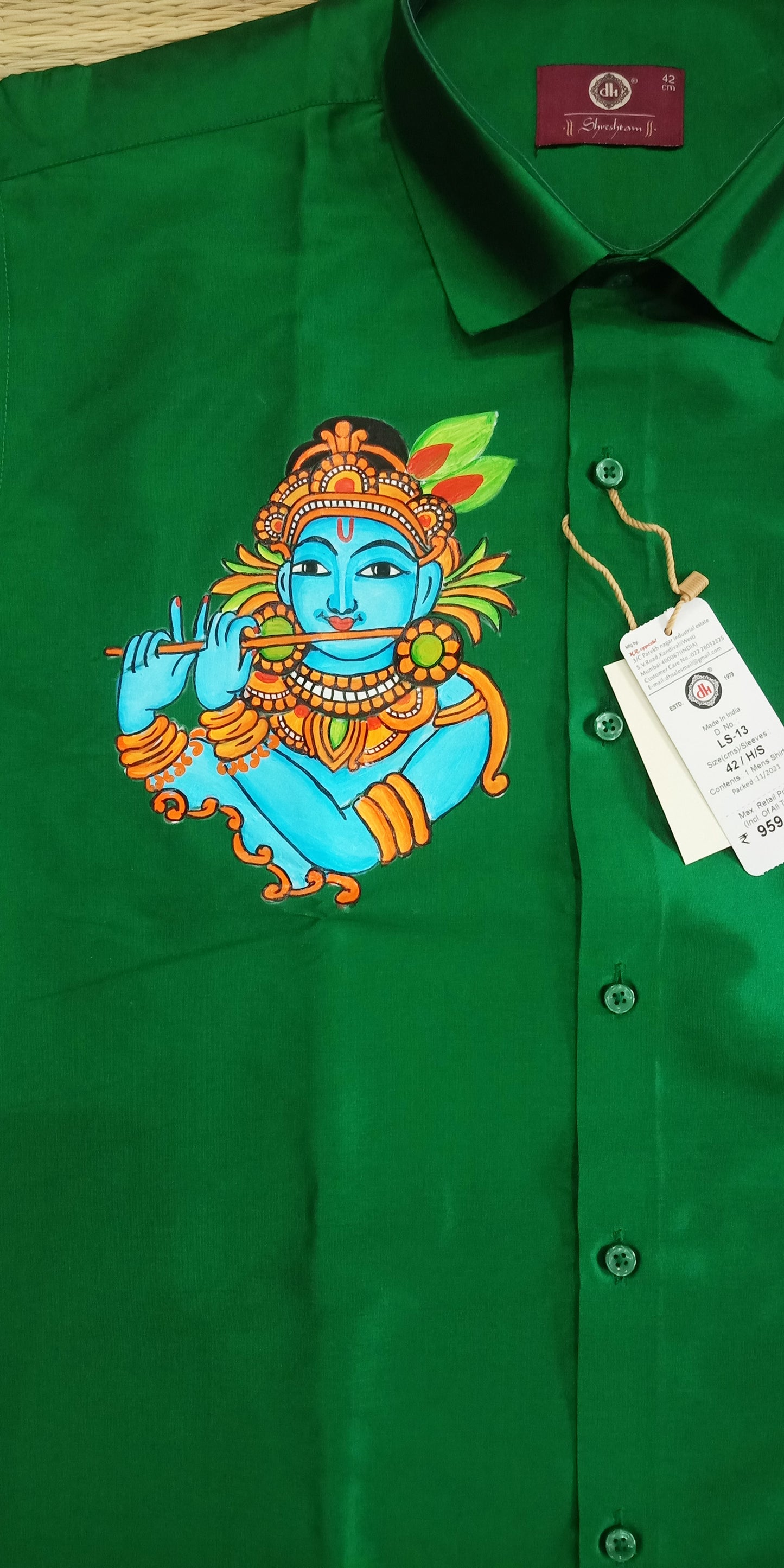 Blue face krishna hand mural painting on green silk shirt