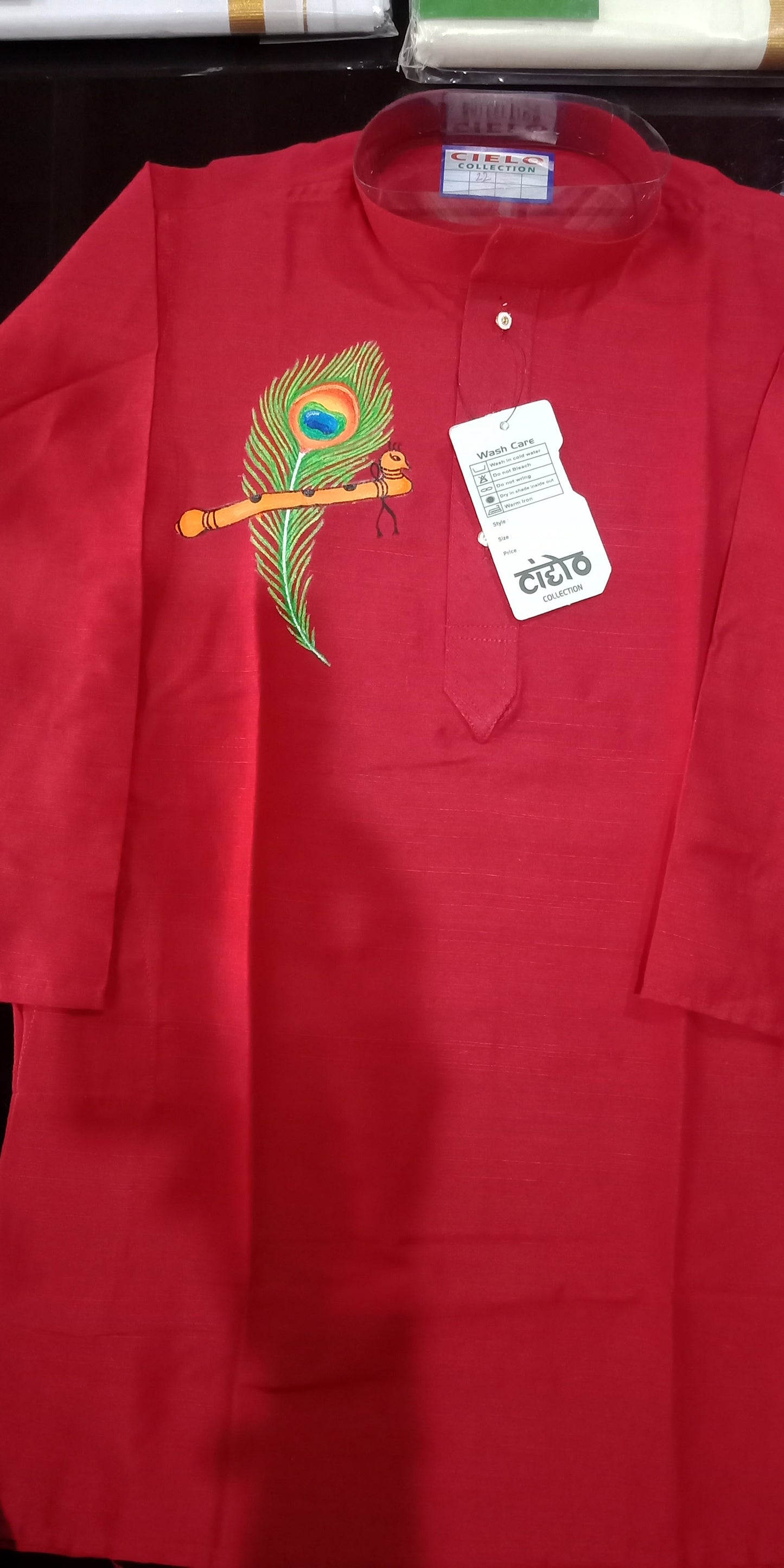 Peeli hand mural painting on red silk kurta