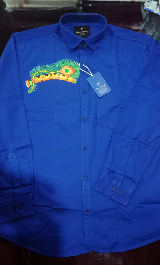 Stylish peeli with flute hand mural painting on blue cotton shirt