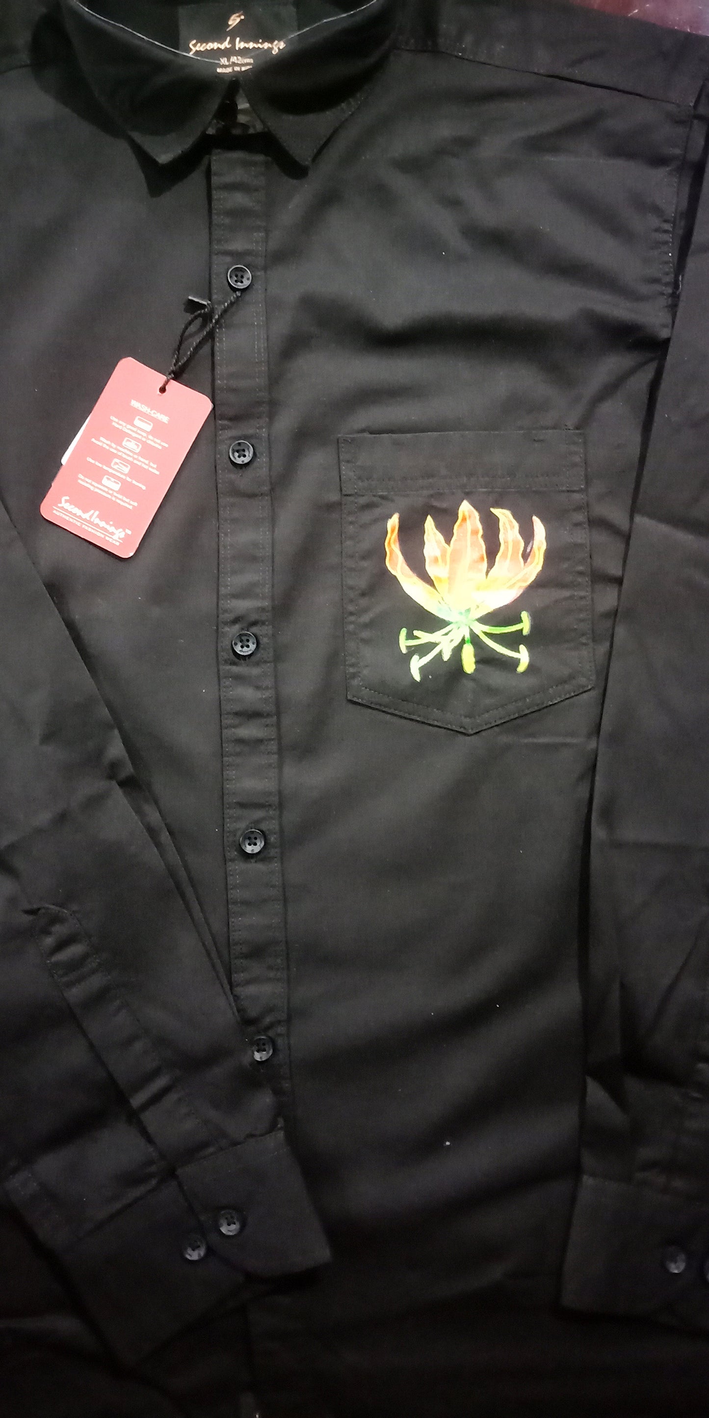 Karthikaipoo flower hand painting on black shirt