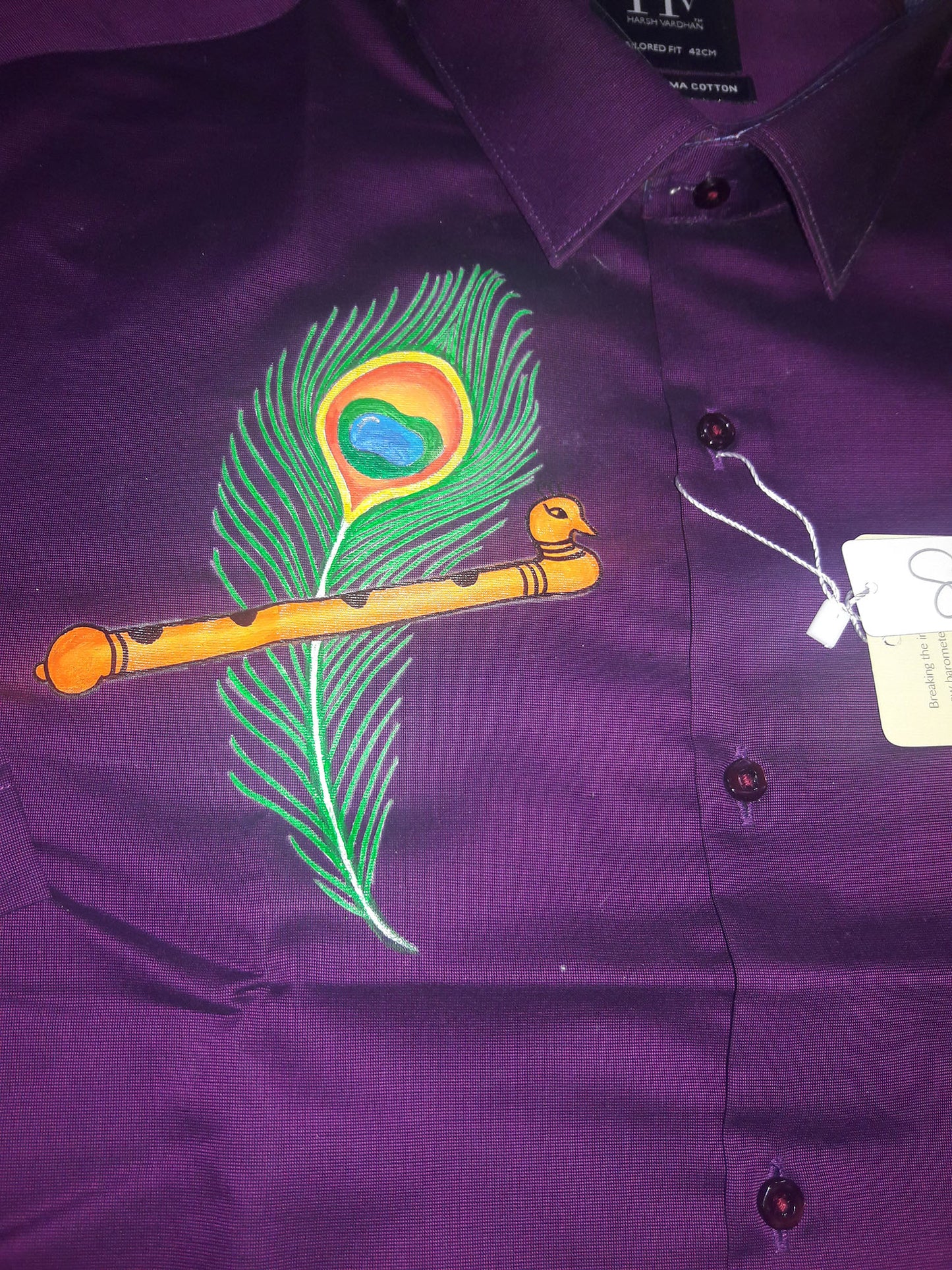 Mazhilpeeli hand mural painting on violet cotton shirt