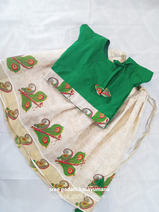 Peeli print kerala tissue pattu pavada with green blouse