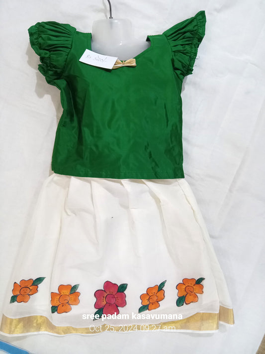 Flower design hand mural painting on kerala pattu pavada with green blouse