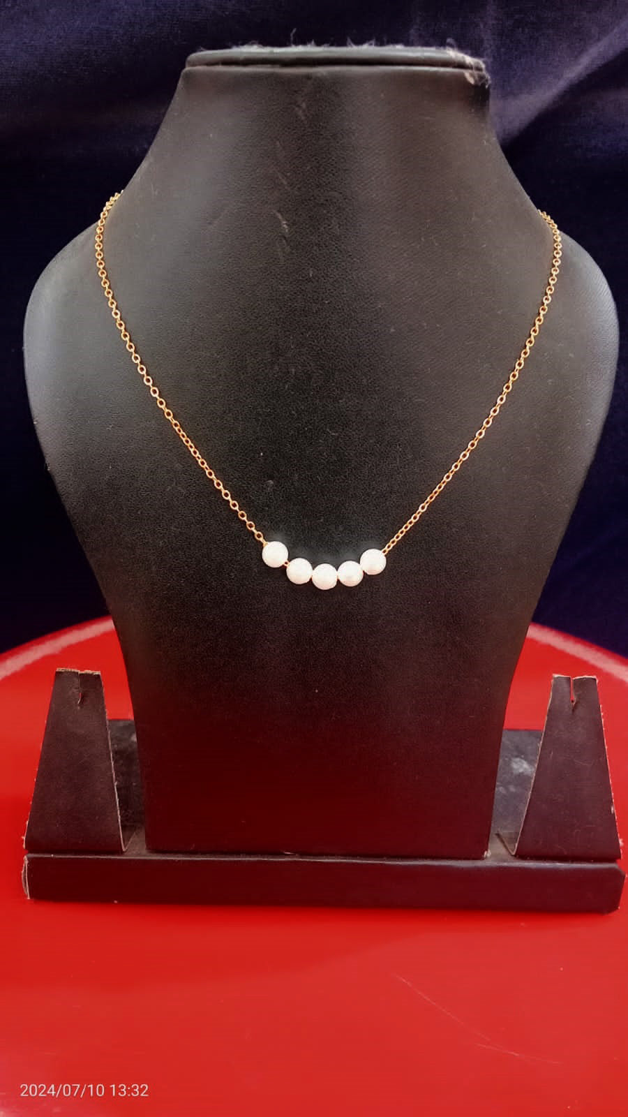 Golden alloy necklace with stylish pearl for women traditional wear