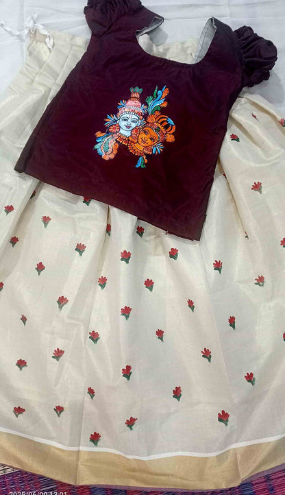 Radha krishna design on top and flower design on kasavu pavada