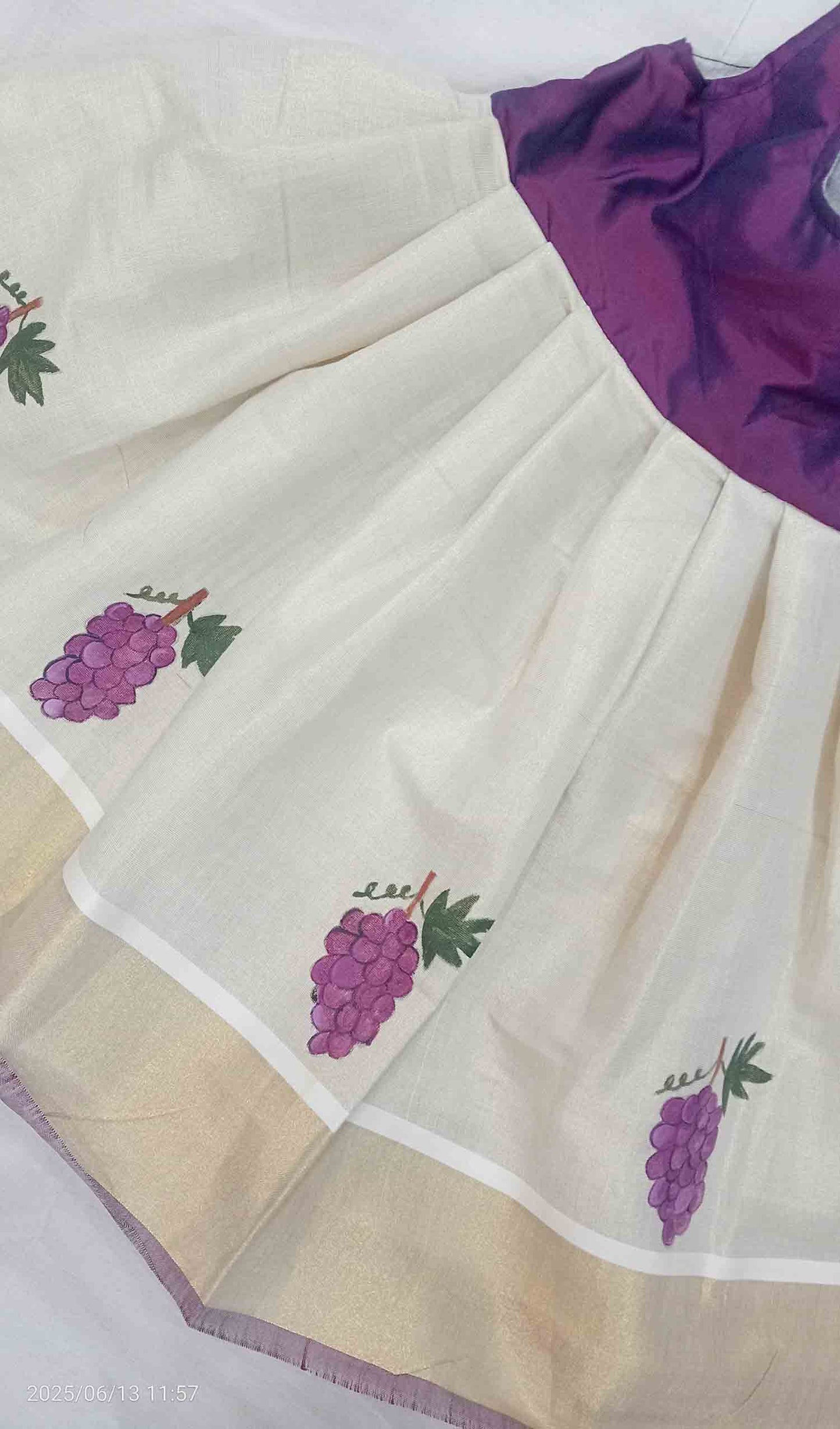 Grape design hand mural painting on kerala tissue kasavu frock