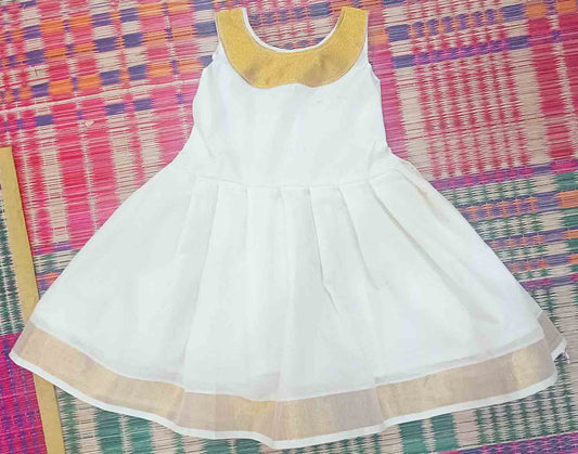 Kerala kasavu frock with golden lace design for kids