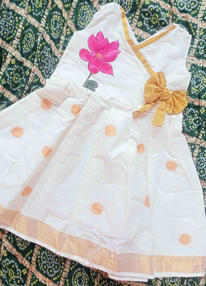 Lotus hand mural painting with bow design kerala kasavu frock for kids