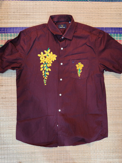 Vishu special kanikonna design on maroon cotton shirt