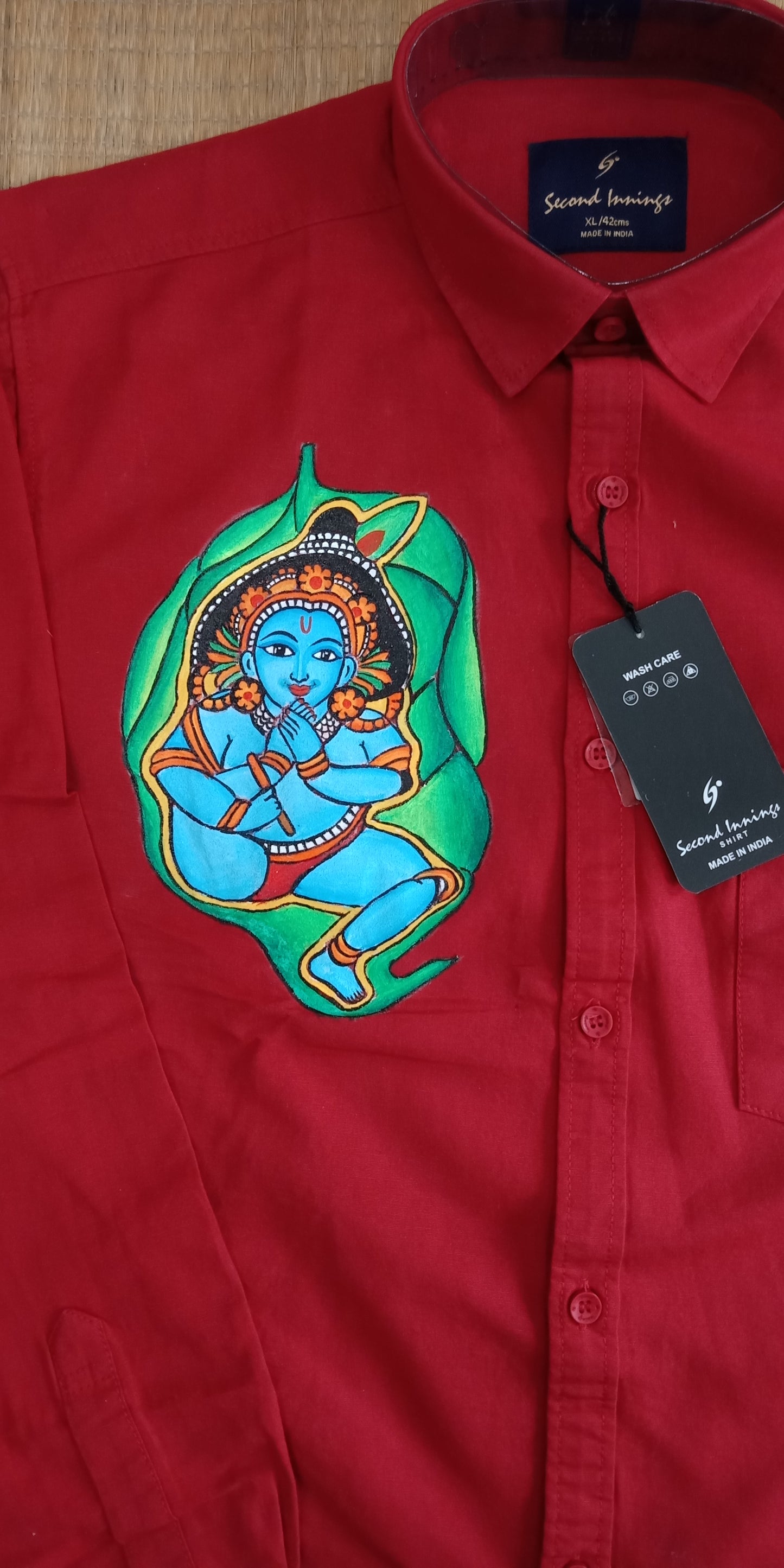 Alila Krishna hand mural painting on red cotton shirt