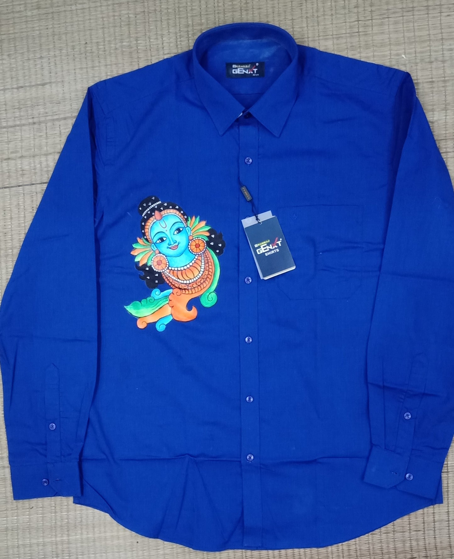 Blue krishna face hand mural painting on blue cotton shirt