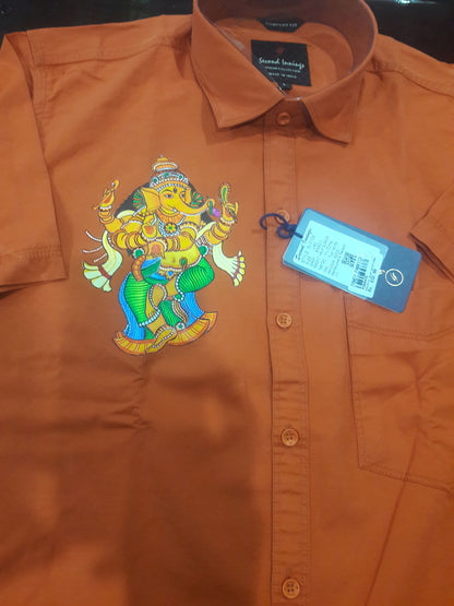 Standing Ganapathi hand mural painting on brown cotton shirt