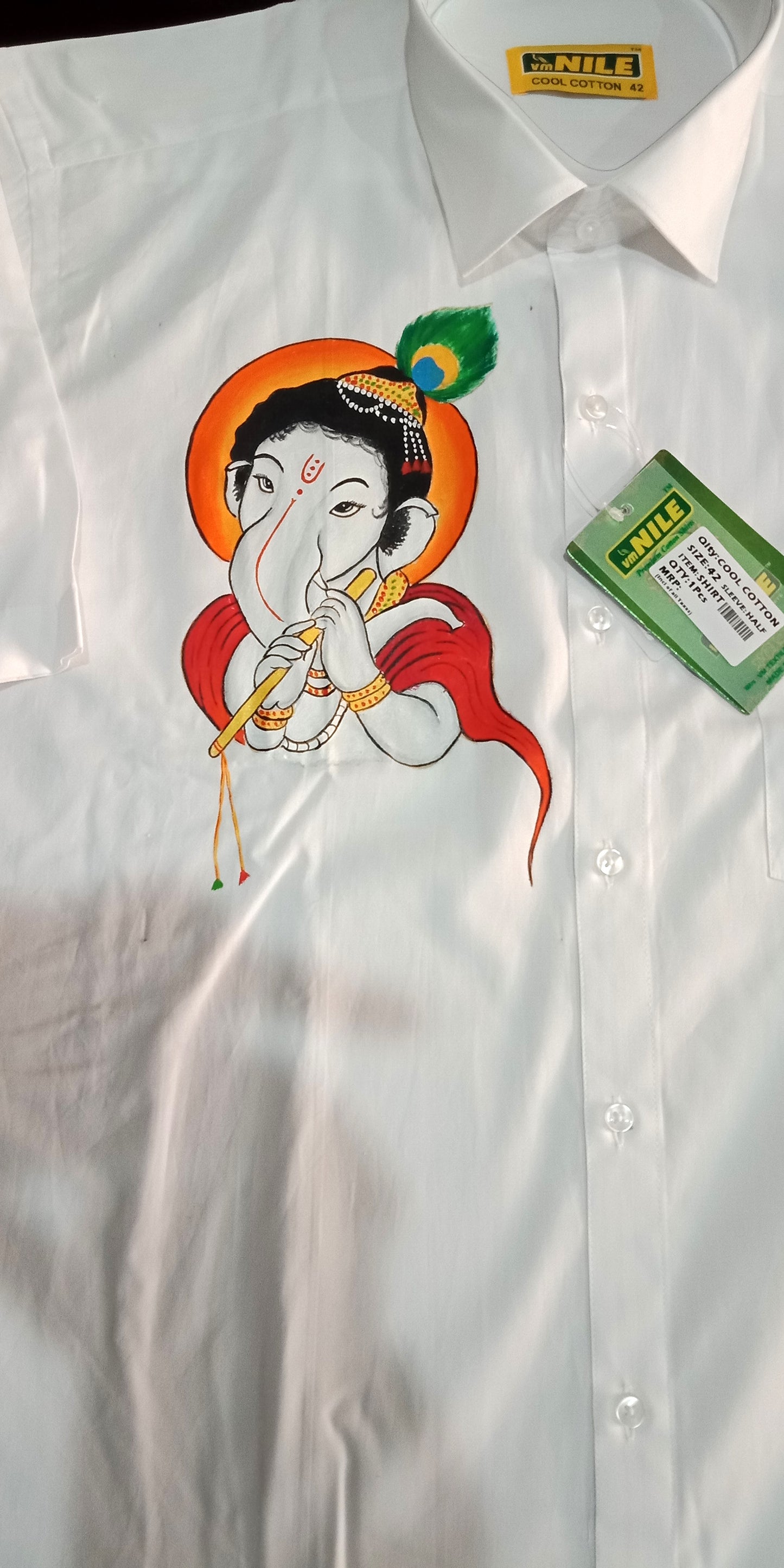 white shade Ganapathi hand mural painting on white shirt